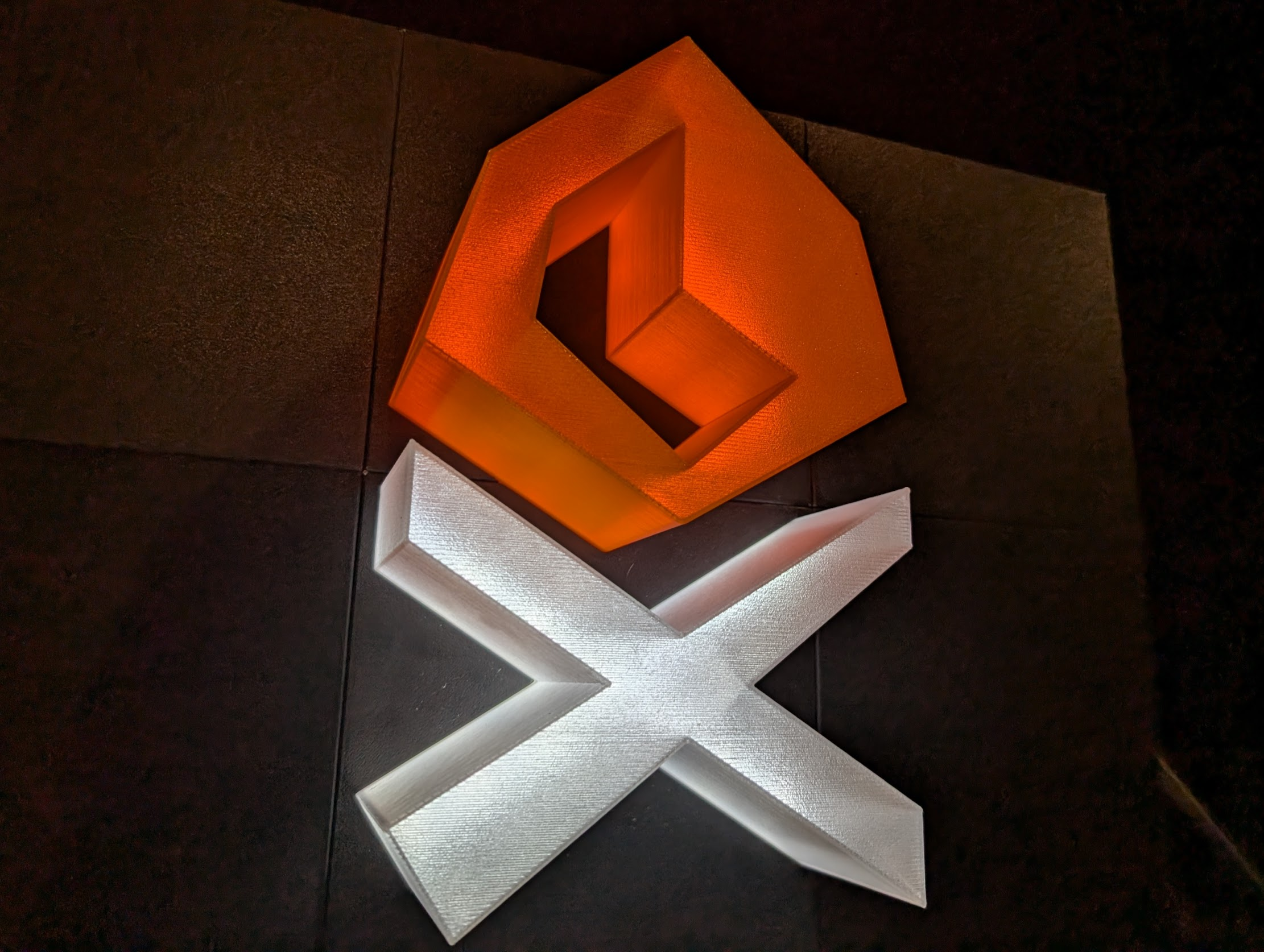 3D-printed glowing XO Ruby Logo