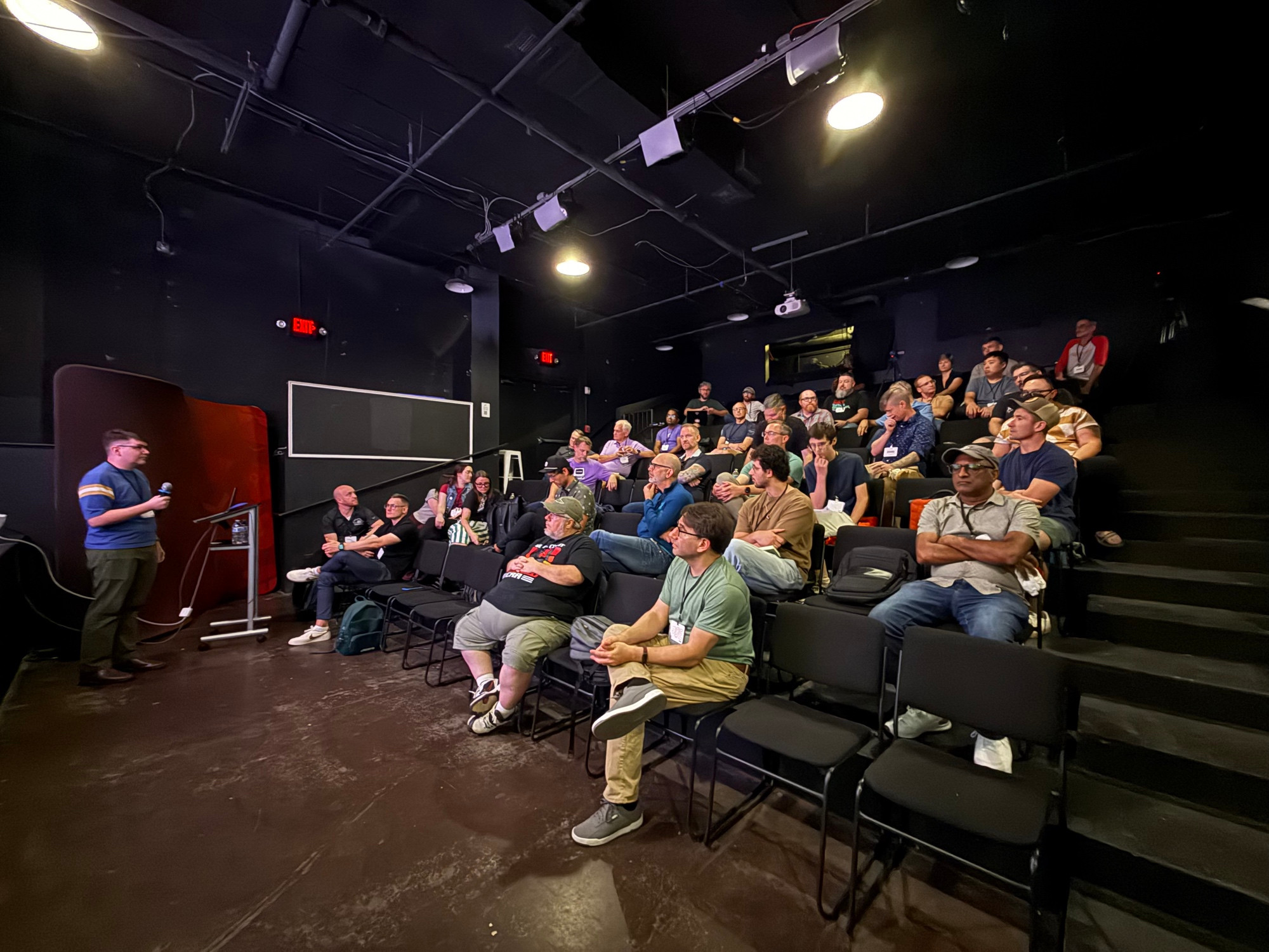A room full of rubyists in the limelight theater, looking at Thomas, waiting for his talk.